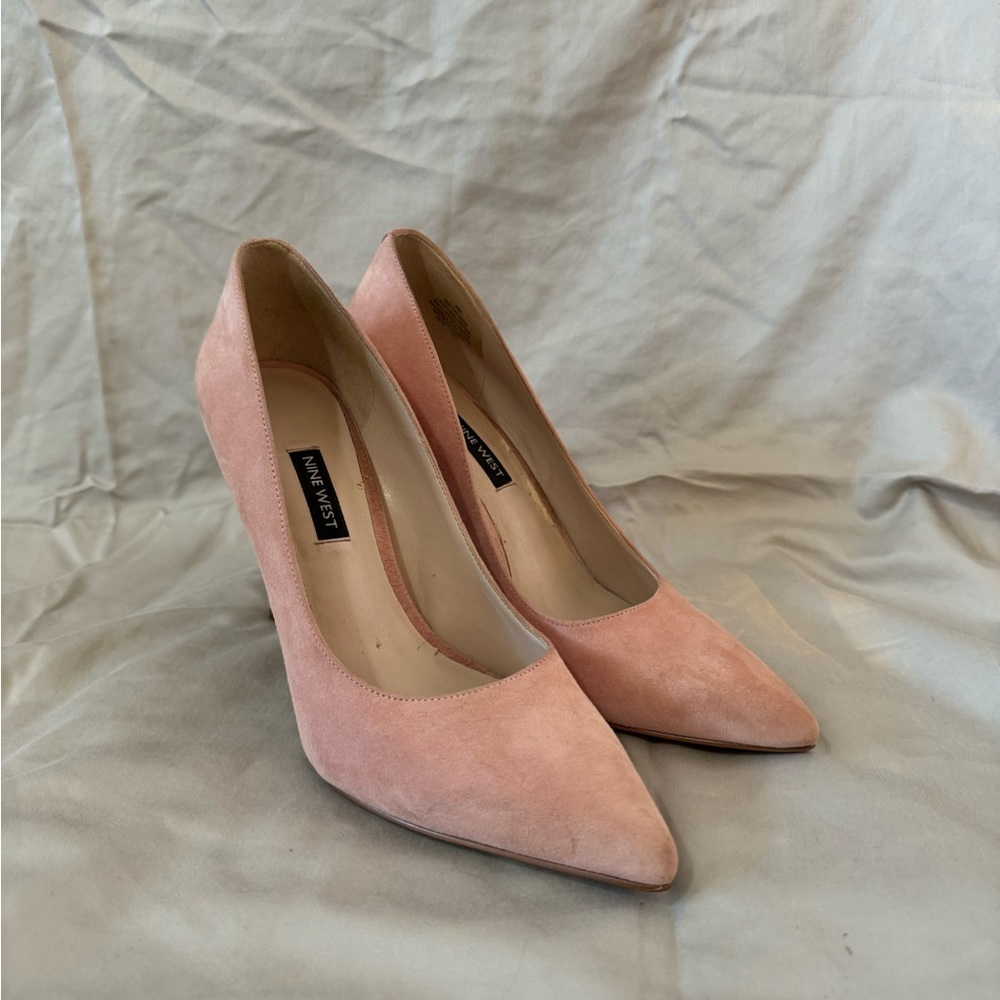 Pink suede pumps
